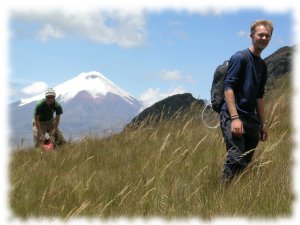 Two of Gee's group of stalwart climbers making it up Cerro Pasochoa with Cotopaxi in the background